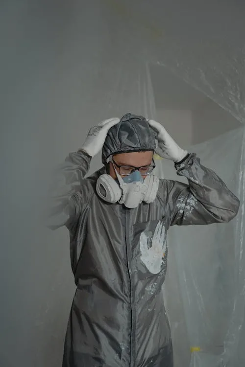 mold remediation colorado springs — certified technician removing black mold with HEPA equipment